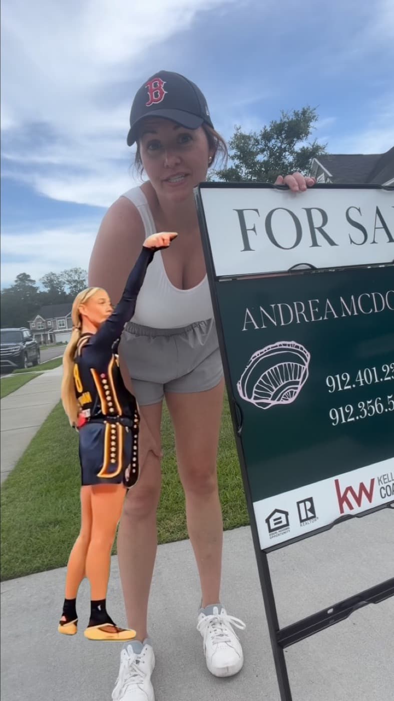 Andrea with one of her branded For Sale signs in a coastal Georgia neighborhood